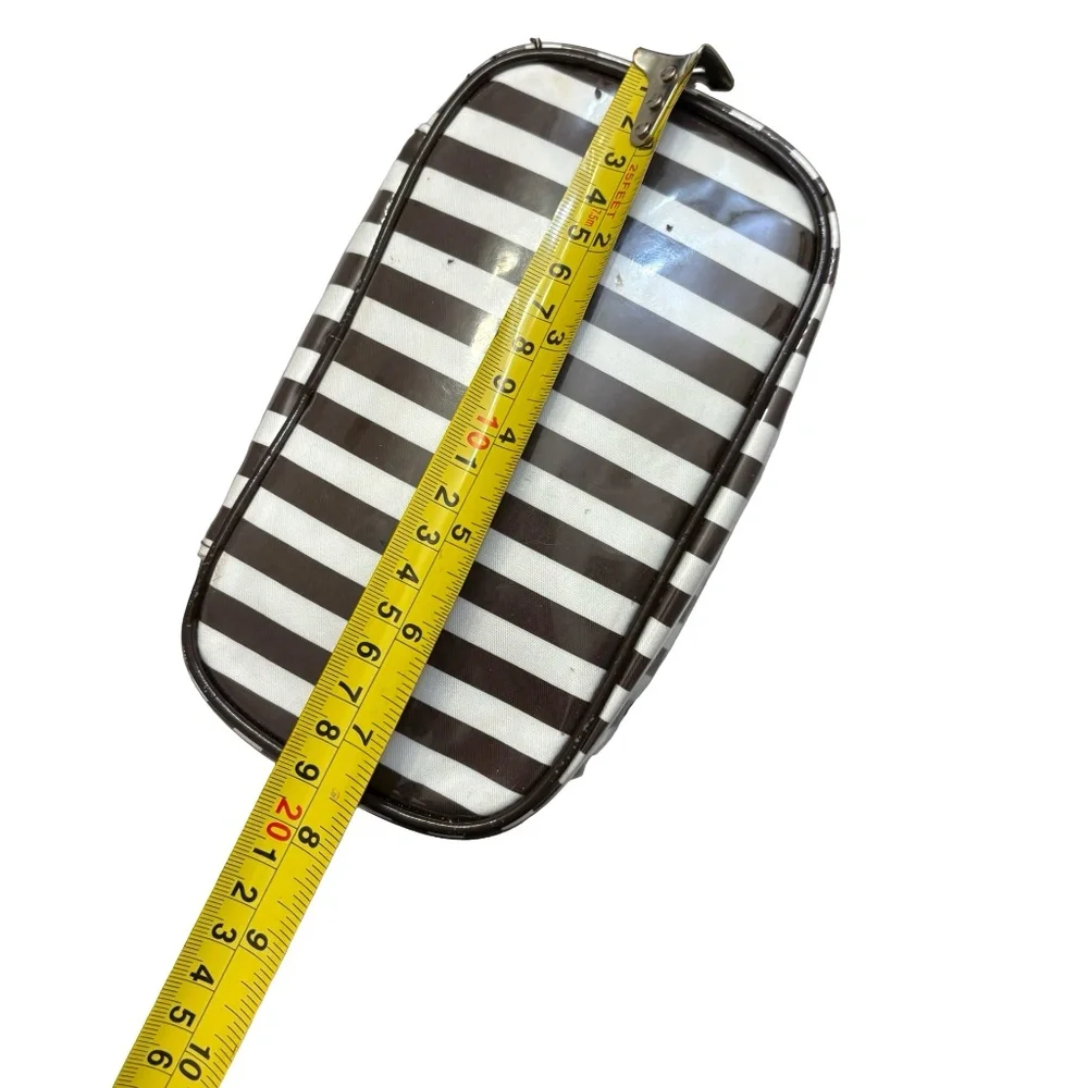 Henri bendel white & brown striped cosmeti case bag.
